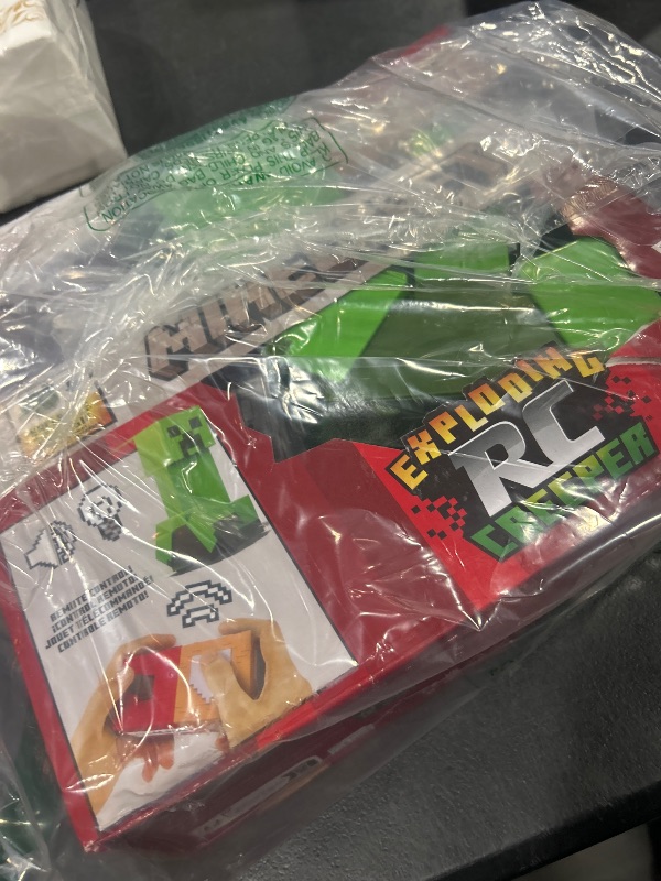 Photo 1 of Mattel Minecraft Exploding RC Creeper with Lights & Sounds, 10 Explosion Particles, Game-Authentic Movement & DLC Code