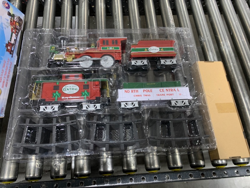 Photo 1 of Lionel Battery-Operated North Pole Central Freight Toy Train Set with Bluetooth, Locomotive, Train Cars, & Track with Authentic Train Sounds, Lights, & Water Vapor Smoke Effects for Kids 4+