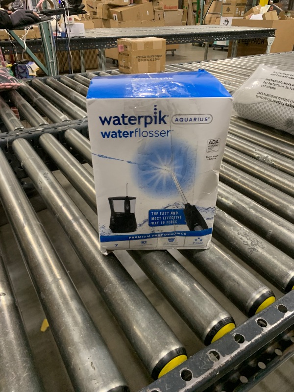 Photo 2 of Waterpik Aquarius Water Flosser Professional For Teeth, Gums, Braces, Dental Care, Electric Power With 10 Settings, 7 Tips For Multiple Users And Needs, ADA Accepted, Black WP-662, Packaging May Vary