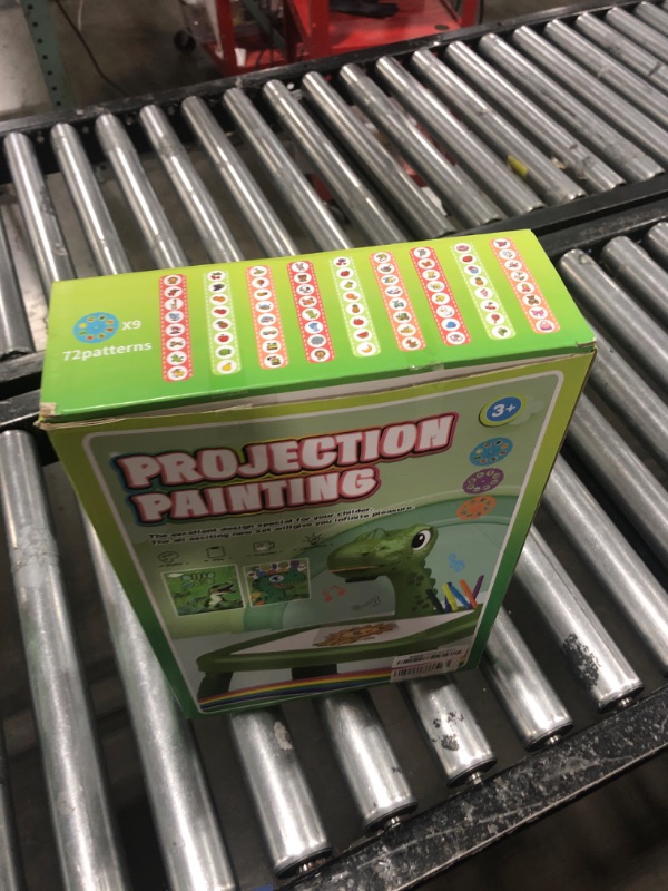 Photo 1 of Drawing Projector for Kids, Drawing Board with Music, Color Pens, Pencils, Crayons, Scrapbook, Dinosaur Sticker Book, Ideal Toy for 3+ Year Old Girls & Boys (Dinosaur Kit)