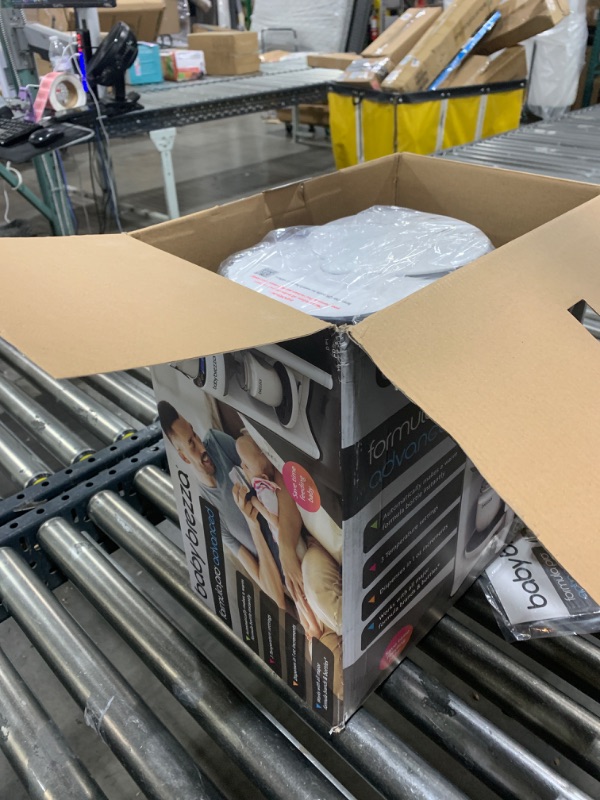 Photo 1 of Baby Brezza New and Improved Formula Pro Advanced Formula Dispenser Machine - Automatically Mix a Warm Formula Bottle Instantly - Easily Make Bottle with Automatic Powder Blending, White