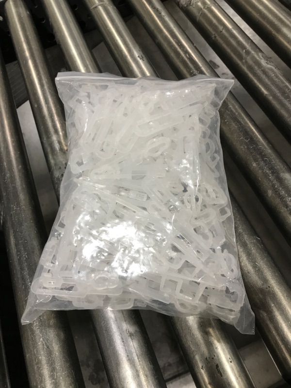 Photo 1 of Christmas Light Clips Omni All-in-One Outdoor Gutter Shingles Clips 100 Pieces Holiday Hanger Hooks Compatible with C9 C7 for Roof, Roof Ridge Line, Fence (Transparent)