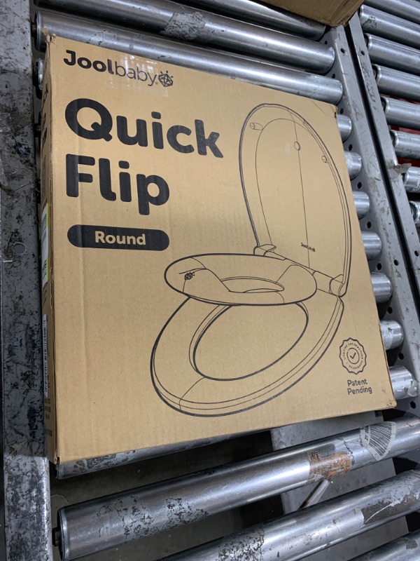 Photo 1 of Quick Flip Elongated Toilet Seat with Built-In Potty & Splash Guard for Toddler Training, Slow Close - Jool Baby