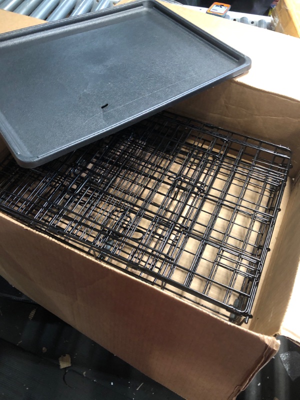 Photo 3 of ***DAMAGED - PAN CRACKED - LIKELY MISSING PARTS - SEE PICTURES***
Amazon Basics - Durable, Foldable Metal Wire Dog Crate with Tray, Single Door, 30 x 19 x 21 Inches, Black