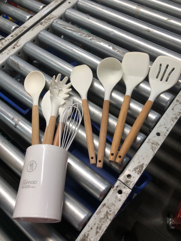 Photo 4 of **PREV USED, LIGHT STAINING**
Silicone Cooking Utensils Set - 600°F Heat Resistant, Nonstick Kitchen Utensil Set with Spatulas, Spoons, Whisk, Tongs, BPA Free, Dishwasher Safe, Cream White