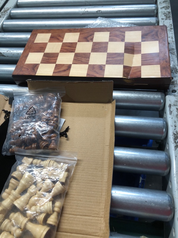 Photo 4 of **MAJOR DAMAGE TO BOARD**
FanVince Chess Set 15" Wooden Board Game - Wood Sets with 2 Storage Bags and 2 Extra Queens - Gifts Box for Men Dad