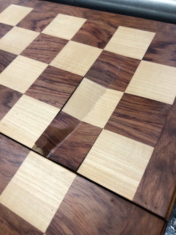 Photo 3 of **MAJOR DAMAGE TO BOARD**
FanVince Chess Set 15" Wooden Board Game - Wood Sets with 2 Storage Bags and 2 Extra Queens - Gifts Box for Men Dad