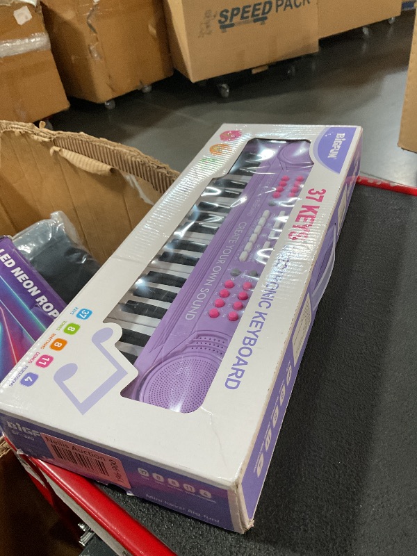 Photo 2 of ***BATTERY COVER IS BROKE OFF**
BIGFUN Kid Keyboard Piano - 37 Keys Keyboard Piano Kids Multifunction Music Educational Instrument Toy Keyboard Piano for 3, 4, 5, 6, 7, 8 Girls and Boys (Purple)