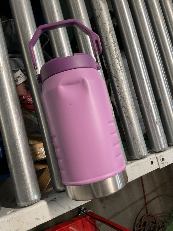 Photo 2 of **MINOR DENT**Stanley IceFlow Flip Straw Jug with Handle 64 oz| Twist On Lid and Flip Up Straw | Leak Resistant for Travel and Sports | Insulated Stainless Steel |BPA-Free |Lilac