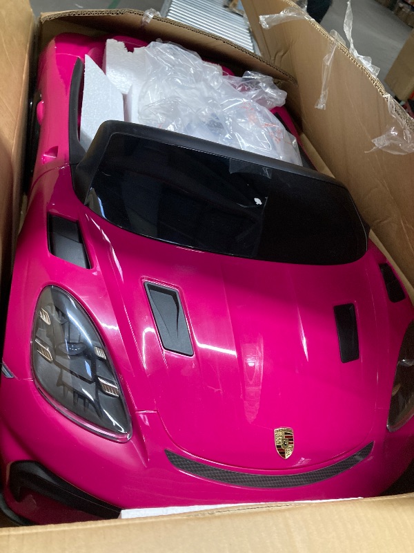 Photo 1 of 12V Ride on Car Licensed Porsche 718, Kids Electric Car with Remote Control, Front/Rear LED Light, Radio, USB/AUX, Openable Doors, Suspension Function, Durable Tires (Pink)