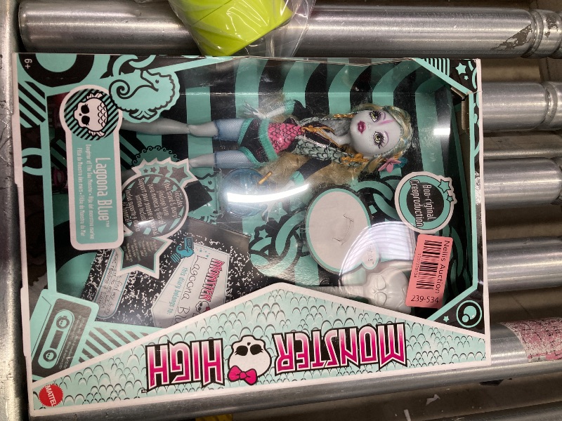 Photo 2 of 
Monster High Lagoona Blue Reproduction Doll Wearing Original Fashion & Shoes with Pet, Display Stand & Accessories, 10-5-inch Collectible Toy