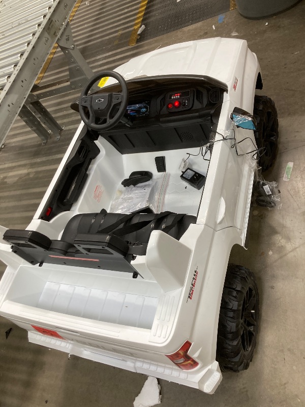 Photo 1 of *see notes*
Chevrolet Silverado 24V Powered Ride on Cars for Kids, Extra large Real 2 Seat Ride on Toys with Remote Control, LED Light, MP3 Player, Electric Vehicles Ride on Truck for Boys Girls Gifts, White
