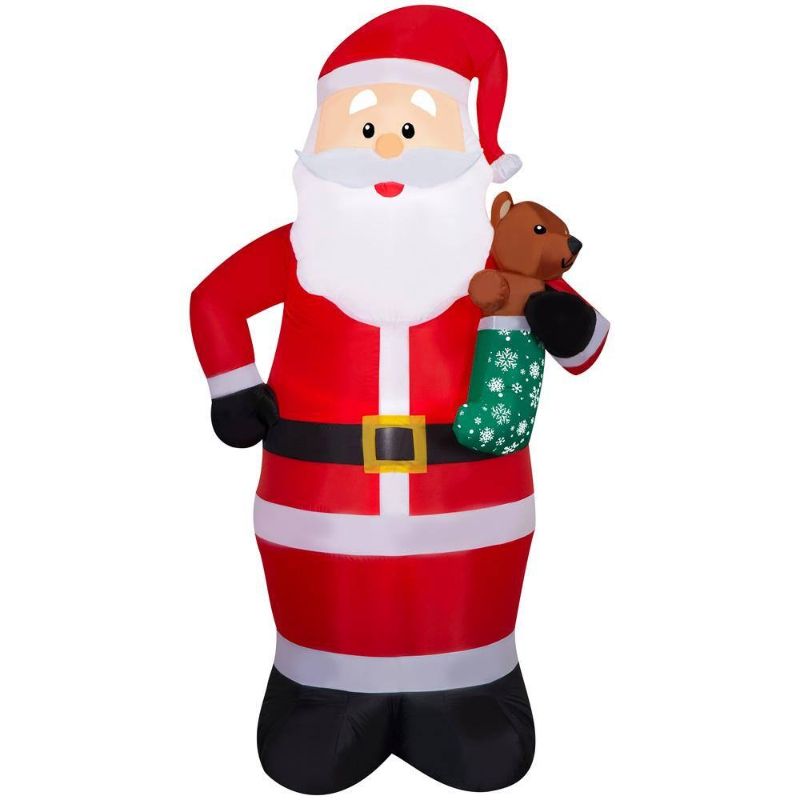 Photo 1 of .5 Ft. LED Santa with Bear Stocking Christmas Airblown® Inflatable