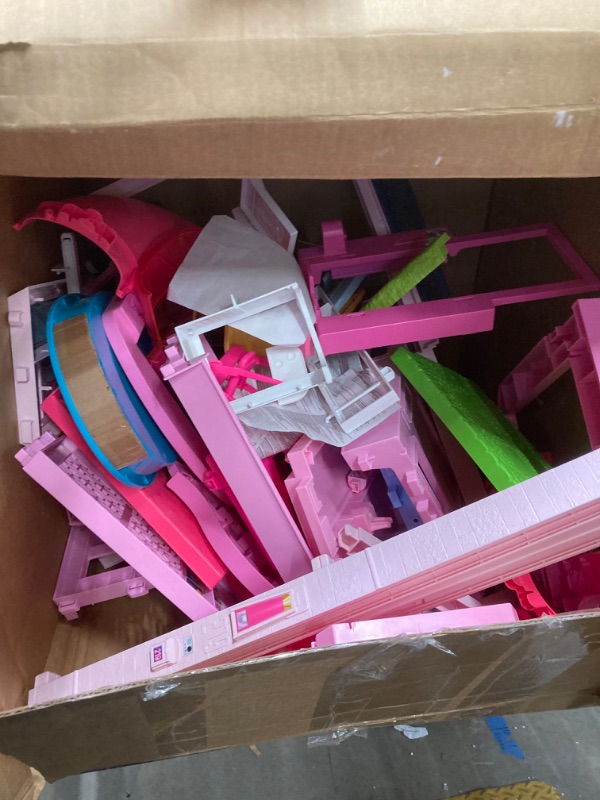 Photo 1 of Barbie DreamHouse, Doll House Playset with 75+ Pieces Including Toy Furniture & 3-Story Pool Slide, Pet Elevator & Puppy Play Areas