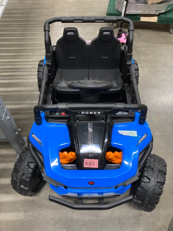 Photo 2 of 12V Battery Powered Kids Ride-On UTV with 4-Wheel Suspension, LED Headlights, Music, and Parental Remote Control for Ages 3-6