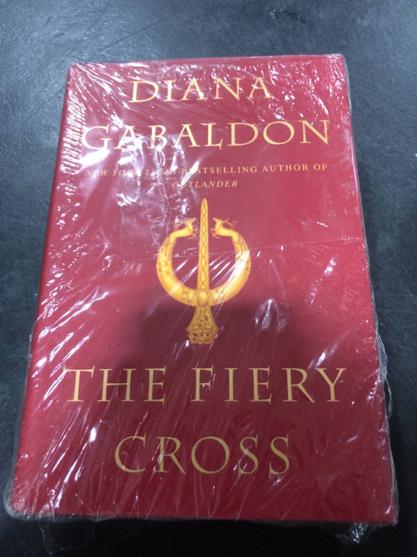 Photo 2 of The Fiery Cross (Outlander) Mass Market Paperback – August 30, 2005
