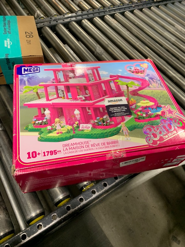 Photo 2 of Mega Barbie The Movie Building Toys Set, DreamHouse Replica with 1795 Pieces, 4 Figures and Accessories, for Adults & Fans