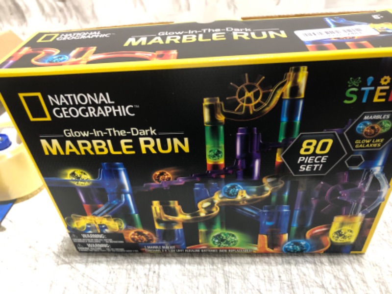 Photo 2 of NATIONAL GEOGRAPHIC Glowing Marble Run – Construction Set with 15 Glow in The Dark Glass Marbles & Storage Bag, STEM Gifts for Boys and Girls, Building Project Toy (Amazon Exclusive)