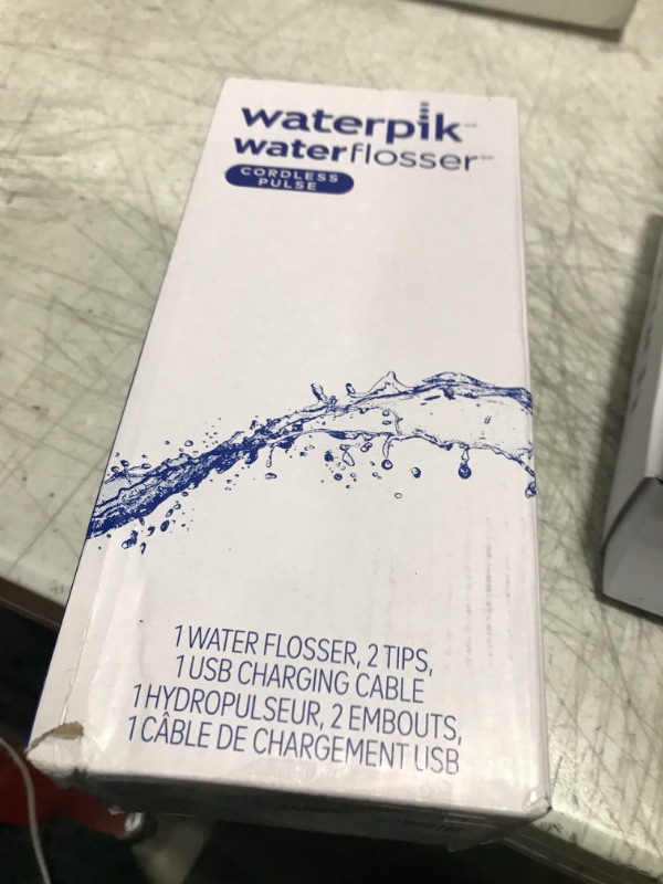 Photo 2 of Waterpik Cordless Pulse Rechargeable Portable Water Flosser for Teeth, Gums, Braces Care and Travel with 2 Flossing Tips, Waterproof, ADA Accepted, WF-20 White, Packaging May Vary