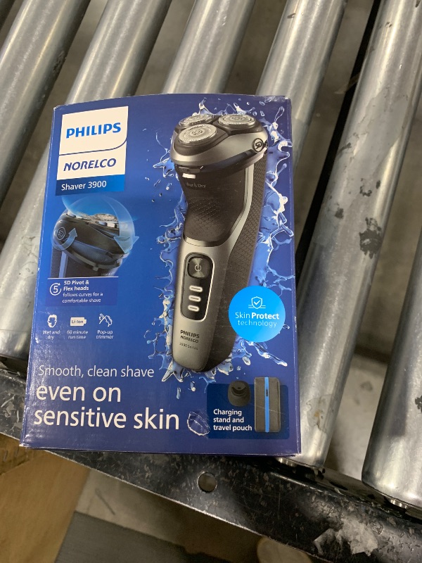 Photo 2 of Philips Norelco Shaver 3900, Rechargeable Wet & Dry Electric Shaver with Pop-up Trimmer, Charging Stand, Travel Storage Pouch, Protective Cap, Space Gray, S3341/92