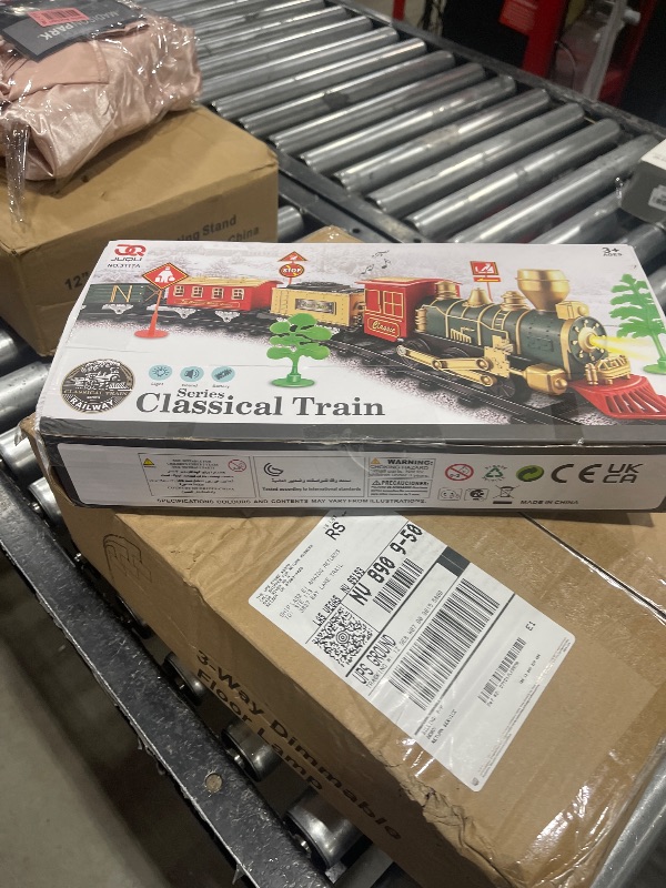 Photo 1 of JUQU Train Set-Electric Train Sets for Boys Toddlers Classical Train Toys,Battery-Powered Locomotive Engine with Sound and Lights, 3 Cars &10 Tracks, Christmas Toy Train for Age 3 4 5 6 Years Old Kids
