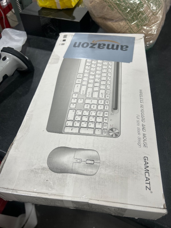 Photo 1 of GAMCATZ Ergonomic Wireless Keyboard and Mouse with Wrist Rest?Phone Holder - 2.4GHz Full-Sized Low-Profile Quiet White Wireless Mouse and Keyboard Combo for Computer, Laptop, PC, Mac-White