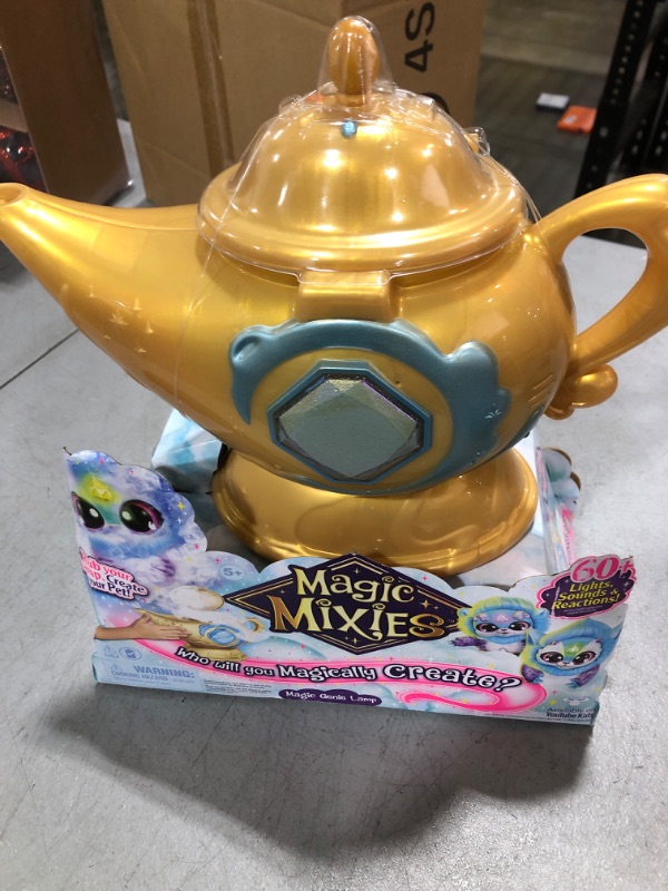 Photo 2 of Magic Mixies Magic Genie Lamp with Interactive 8" Pink Plush Toy and 60+ Sounds & Reactions. Unlock a Magic Ring and Reveal a Pink Genie from The Real Misting Lamp. Gifts for Kids, Ages 5+ Blue