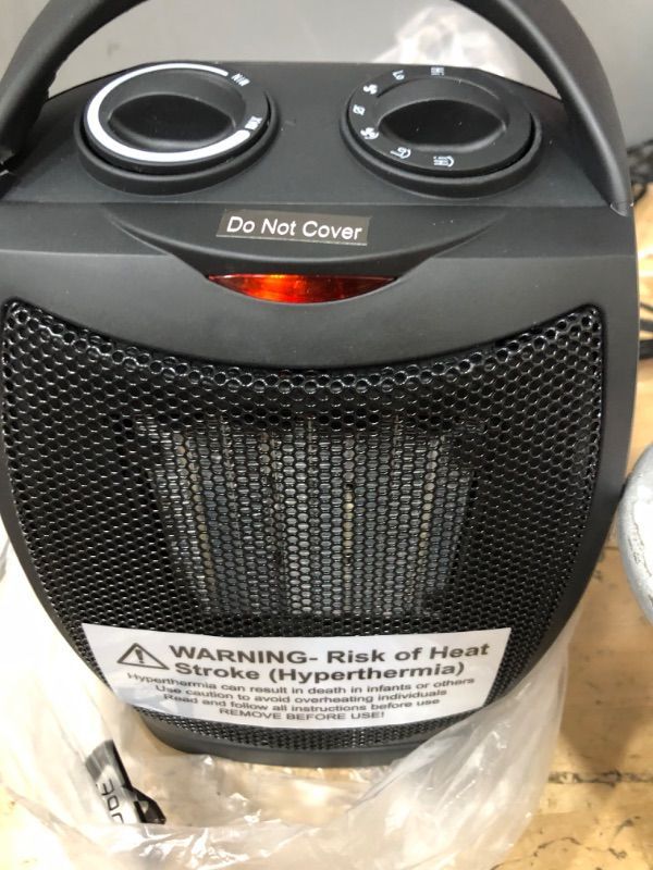 Photo 1 of **CARRY HANDLE BROKEN**
LOMI 1500 Watt Electric Heater