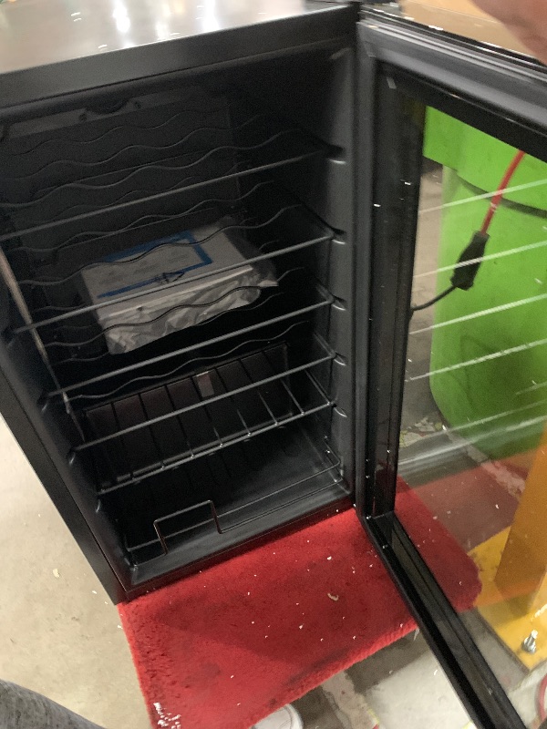 Photo 1 of *POWERS ON* Newair 24 Bottle Wine Cooler Refrigerator | Shadow Series | Freestanding Mirrored Wine and Beverage Fridge with Double-Layer Tempered Glass Door & Compressor Cooling For Reds, Whites, & Sparkling Wine