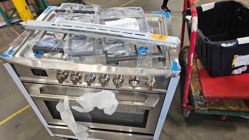 Photo 1 of badly dented
RANGAIRE RRG361TS 36" Gas Range, 5 Sealed Burners, 4.3 cu. Ft. Capacity, Freestanding Slide-in Convection Oven, Easy Reach Racks, Clock and Timer, Stainless Steel