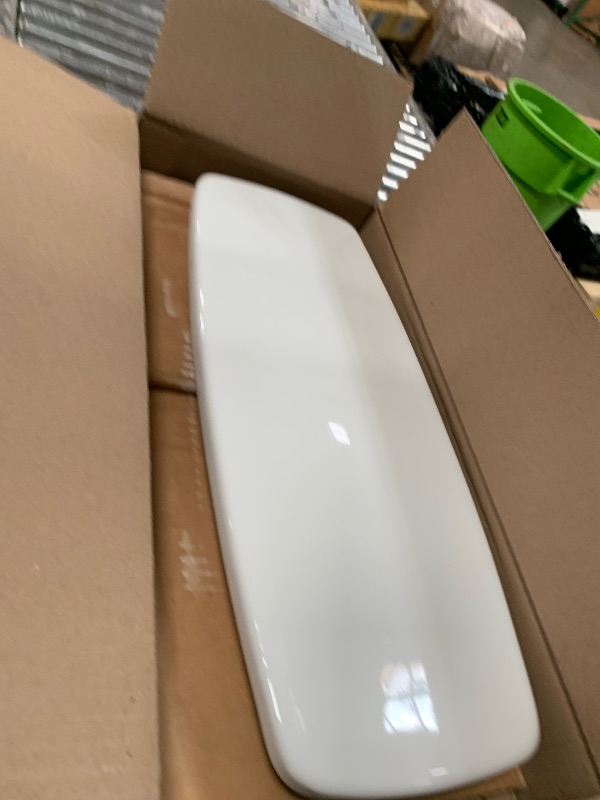 Photo 1 of *************THIS ONLY INCLUDES THE TANK******************

TOTO Drake Transitional Two-Piece Elongated 1.28 GPF Universal Height TORNADO FLUSH Toilet with CEFIONTECT, Cotton White - CST786CEFG#01