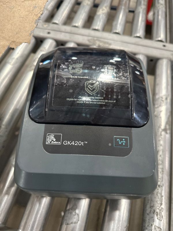 Photo 1 of ***(NO RETURNS OR REFUNDS/ FOR PARTS ONLY/ NON FUNCTIONAL)***
ZEBRA GK420t Thermal Transfer Monochrome Desktop Printer Print Width of 4 in USB and Ethernet Port Connectivity GK42-102210-000