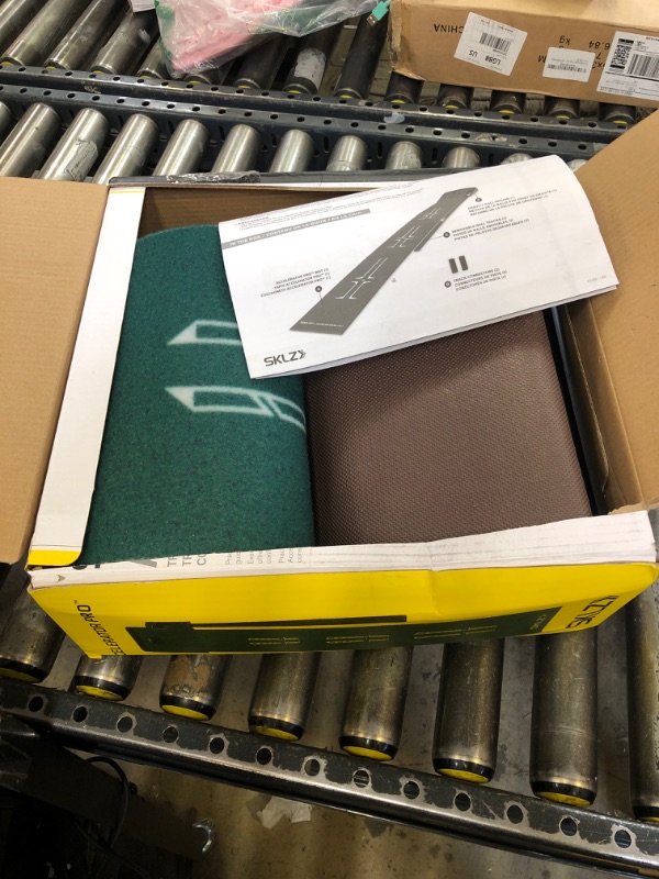 Photo 1 of SKLZ ACCELERATOR PRO - Indoor Golf Putting Mat with Auto-Ball Return & Behind-the-Hole Ball Collector - Putter Alignment Guides at 3, 5 & 7 Feet - Rubber-Backed Mat Provides Multi-Surface Stability
