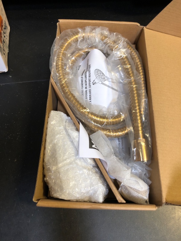 Photo 1 of Moen Engage Magnetix Brushed Gold Six-Function 5.5-Inch Wide Handheld Showerhead with Magnetic Docking System and Metal Hose, 3662EPBG