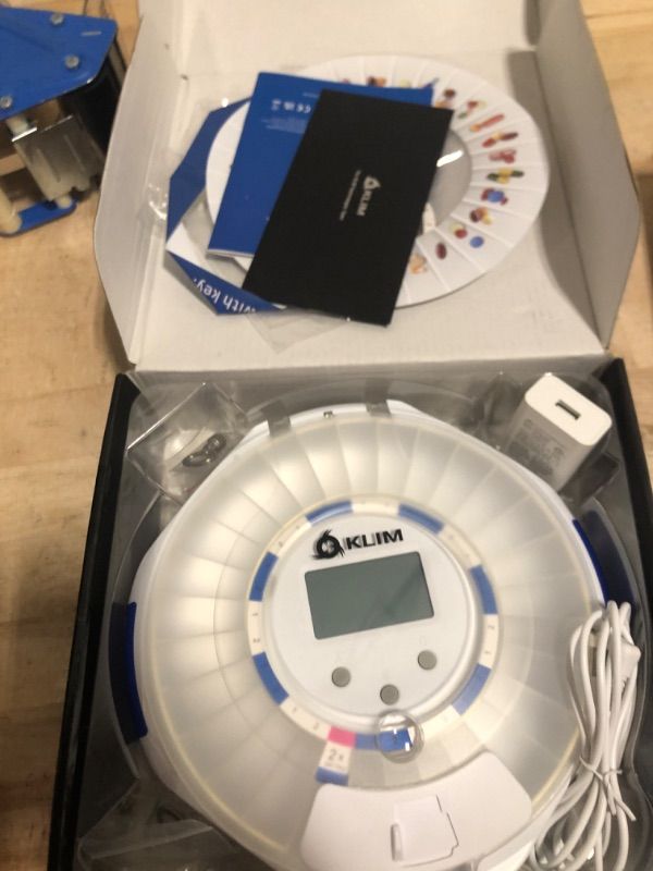 Photo 1 of KLIM Smart Pill Dispenser Machine with Alarm + WiFi App Monitoring + 28 Day Medicine Dispenser + Automatic Pill Dispenser for Elderly with Alarm & Alzheimers Care + Lock Key + New 2024