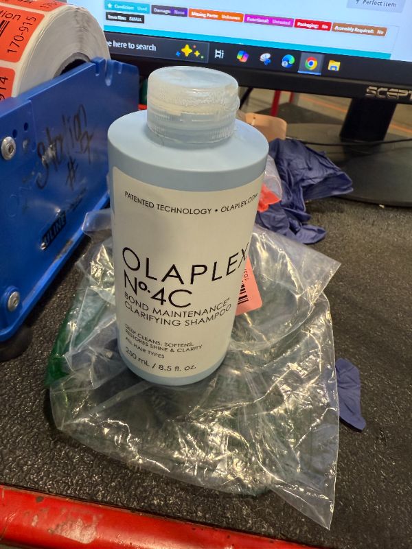 Photo 2 of **USED** Olaplex No. 4C Bond Maintenance Clarifying Shampoo, Deep Cleans, Softens, Restores Shine, & Clarity, For All Hair Types Experiencing Product Buildup or Excess Oil, 8.5 fl oz