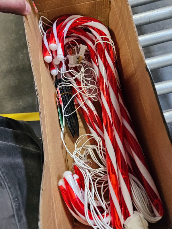 Photo 2 of **USED**
COOLWUFAN 22" Christmas Candy Cane Pathway Markers, Set of 12 Pack Christmas Outdoor Decorations Pathway Lights with 60 Warm Lights for Indoor and Outdoor Christmas Holiday Party Patio Yard Decor