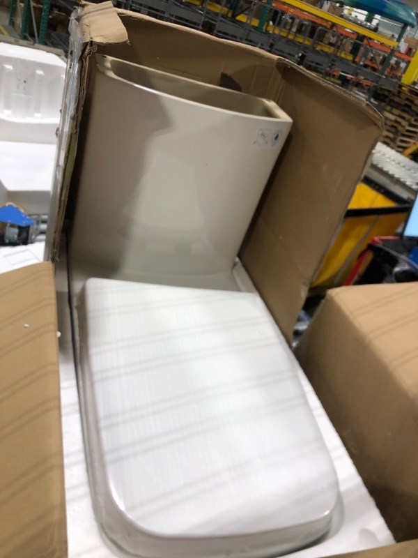 Photo 1 of MEJE #1015 - Modern Square Design One Piece Toilet with Comfort Seat Height,Soft Close Seat Cover, Dual Flush, White ***TOILET CRACKED***