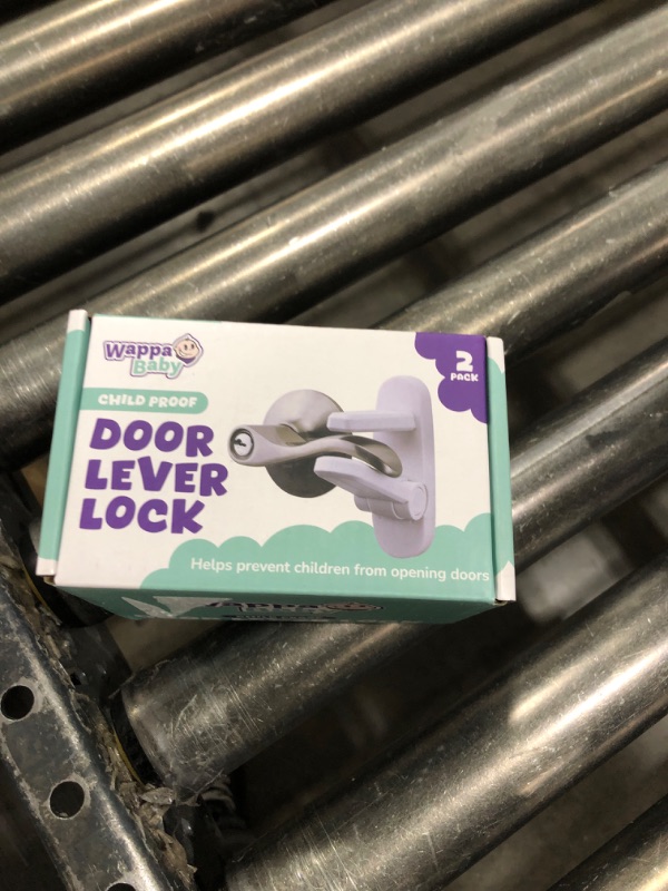 Photo 1 of Door Lever Lock (2 Pack) – Prevents Toddlers from Opening Doors – Easy One-Hand Operation for Adults – Durable ABS with 3M Adhesive Backing – No Tools Needed for Install