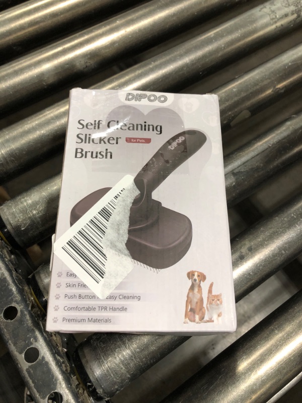Photo 1 of Dipoo Self Cleaning Shedding Brush - Skin Friendly Grooming Tool for Dogs, Cats, and Puppies, Deshedding and Hair Removal for Long and Short Haired Pets, Black