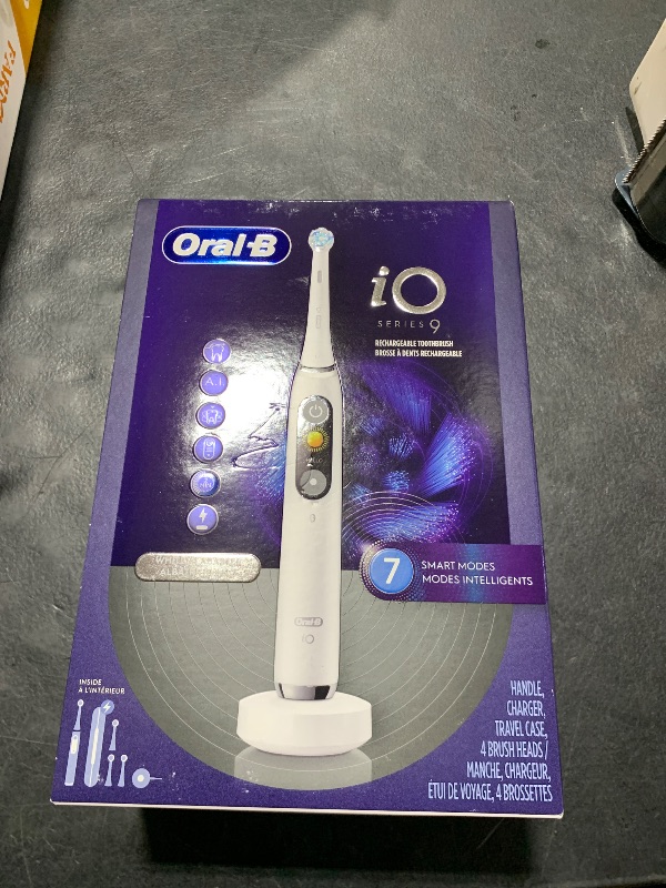 Photo 1 of Oral-B iO Series 9 Electric Toothbrush with 3 Replacement Brush Heads, White Alabaster