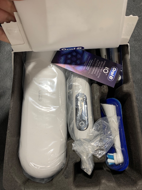 Photo 1 of Oral-B iO Series 9 Electric Toothbrush with 3 Replacement Brush Heads, White Alabaster