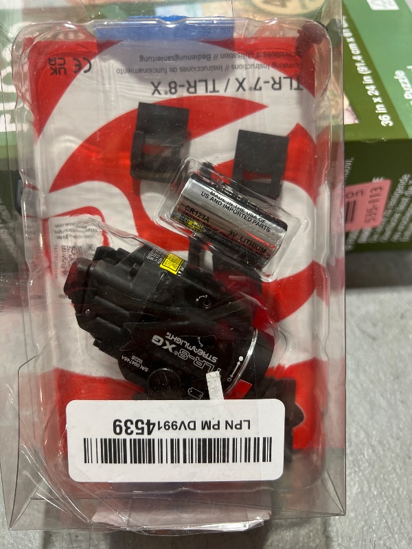 Photo 1 of Streamlight 69434 TLR-8A G Flex 500-Lumen Low Profile Pistol Light with Integrated Green Aiming Laser for Select Handguns, Includes Rear Switches, Mounting Kit, and Keys, Black