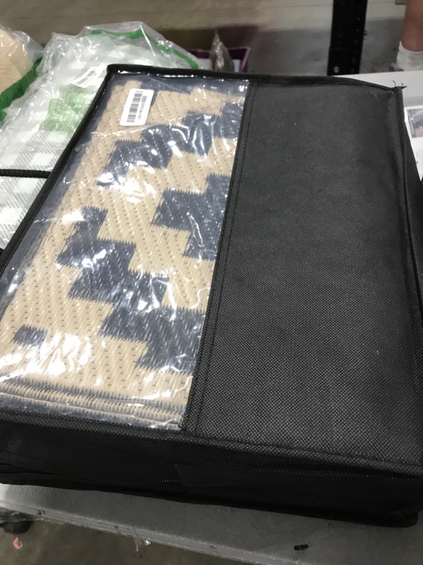Photo 1 of OLANLY Waterproof Outdoor Rug 5x8 ft, Outdoor Plastic Straw Rug for Camping, RV Mat Outside, Outdoor Carpet for Porch, Deck, Backyard, Balcony, Picnic, Black & Beige