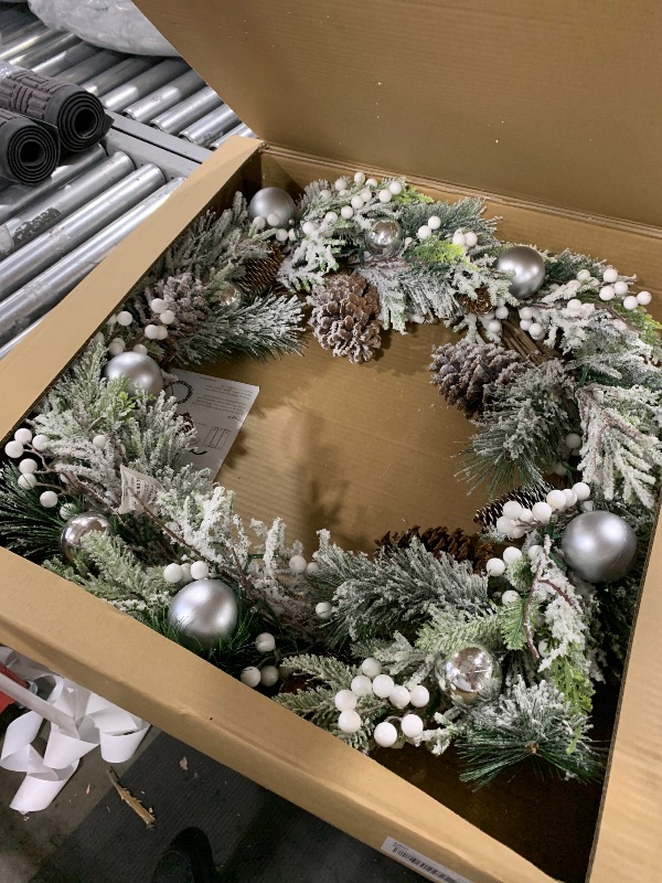 Photo 1 of Red Co. 30” Decorative Snow-Flocked Artificial Light-Up Christmas Wreath with Silver Ornaments, Battery-Operated LED Lights with Timer