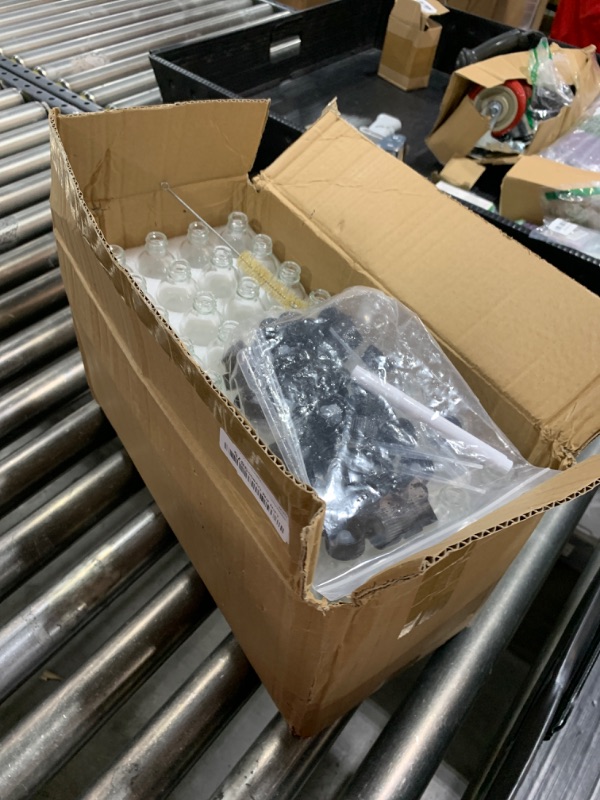Photo 1 of MMonDod (Pack of 72) 2oz Small Clear Glass Bottles(60ml) with Lids Boston Round Travel Bottles for Vanilla Hot Sauce Juice Whiskey Liquid come with 72 Labels,5 Funnels,5 Droppers,1 Brush