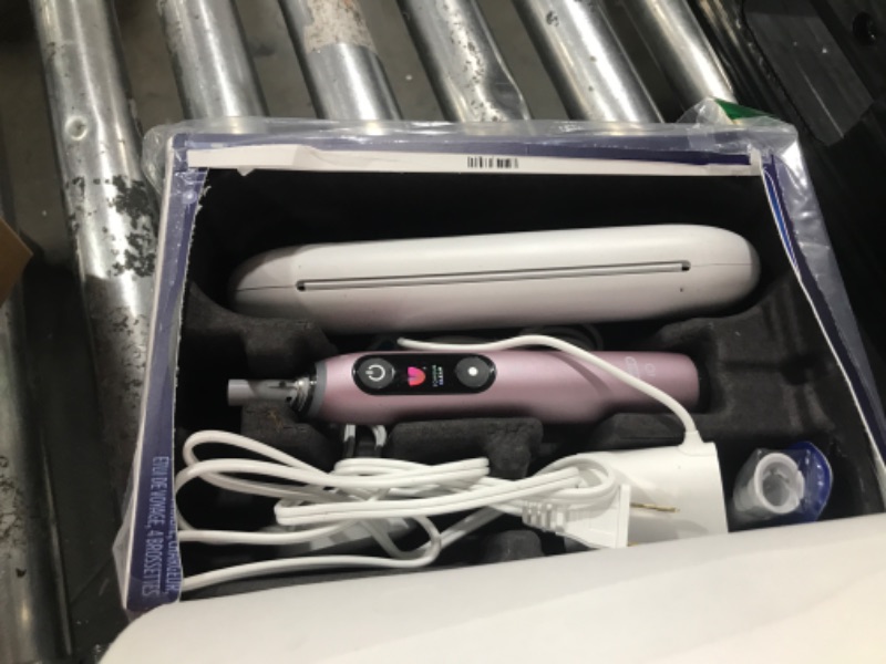 Photo 1 of Oral-B iO Series 9 Electric Toothbrush with 3 Replacement Brush Heads, Black Onyx