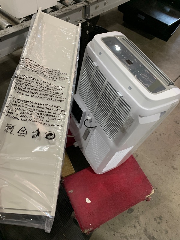 Photo 1 of BLACK+DECKER 12,000 BTU Portable Air Conditioner up to 550 Sq.Ft. with Remote Control, White