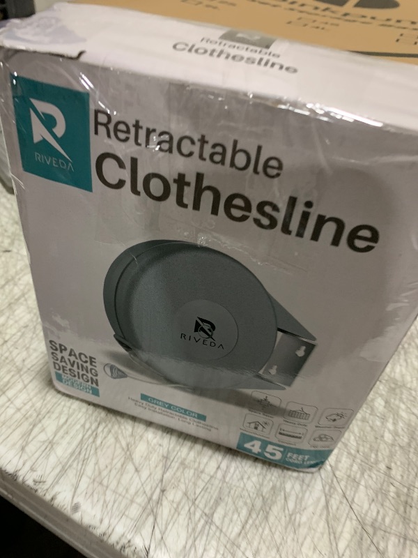 Photo 1 of Retractable Clothesline - Portable Heavy Duty Indoor and Outdoor Washing Line - 40 Feet PVC Retracting Clothes Line with Wall Mount Hang The Wet Dry Clothing Laundry - Easy Installation (Grey)