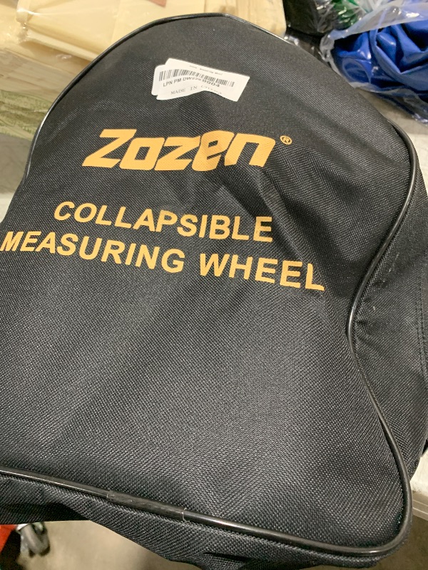 Photo 1 of Zozen Distance Measuring Wheel in Feet and Inches, Collapsible Measure Wheel - Imperial Industrial with Big Kickstand to Keep Stand, Include Backpack and Tape Ruler, Adapt to Various Roads.